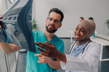 Medical professionals examining x ray for accurate diagnosis