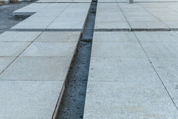 Concrete pavement under construction.
