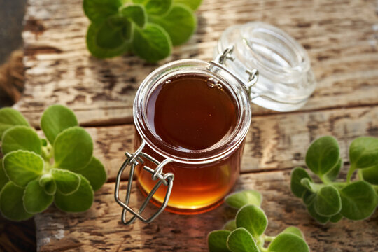 A jar of Coleus amboinicus syrup for common cold