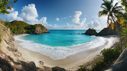 Aerial view of a tropical beach with turquoise water and white sand surrounded by lush greenery