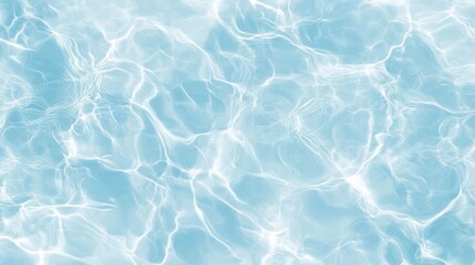 Obraz premium The tranquil and rippling surface of clear blue water is shown