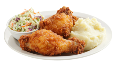A plate of crispy fried chicken served with a side of coleslaw and dipping sauce Isolated on transparent background PNG