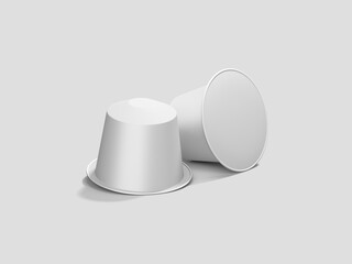 White Coffee Capsules with Blank Packaging on Gray Background
