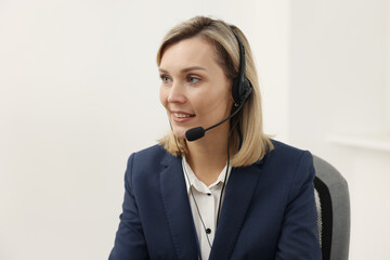 Technical support call center. Portrait of smiling operator in office