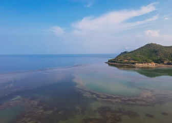 The beauty of Christo Rei Beach and Fatucama Hill seen from a height, one of the most famous tourist destinations in Dili City, Timor Leste. Aerial view.