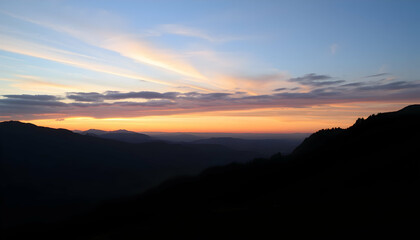 Obraz premium Serene Sunset Over Majestic Mountain Ranges Peaceful Landscape Panorama