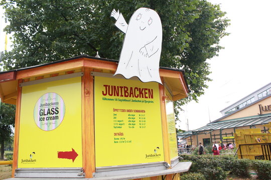 signpost to the Junibacken Children's Museum, a museum dedicated to Swedish children's literature, in particular Astrid Lindgren. Sweden. Stockholm. July 29, 2013.