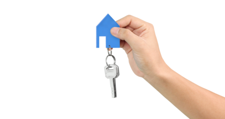 Hand holding house key and blue paper house symbolizing new home ownership indoor setting real estate concept close-up view for seo impact