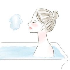 入浴するお団子の髪型の横顔の女性