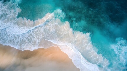 Aerial View of Turquoise Ocean Waves Crashing on Sandy Beach