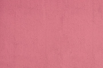 Bright pink wall texture background. pattern of pink wall as a backdrop. red beige pastel cement plaster texture plastered stucco wall white painted fade background. front view.