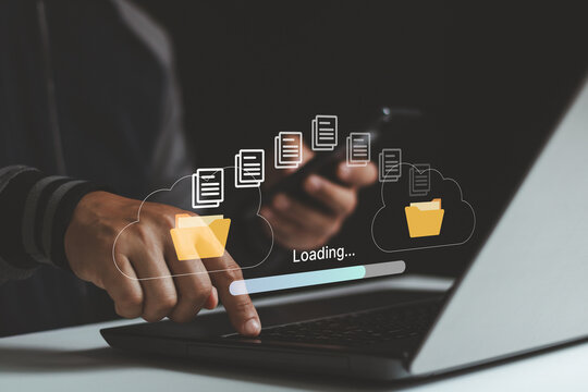 Transfer file business data backup system with internet cloud computing storage AI technology concept. Hand using laptop computer waiting to download document process with loading on virtual screen. - Powered by Adobe