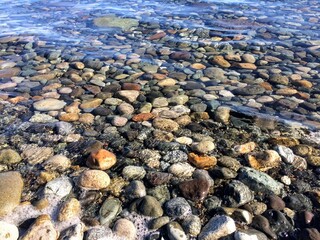 Stones at rest in a calm lake