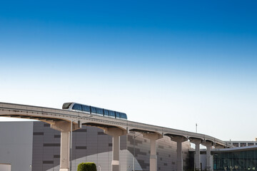 Las Vegas Monorail traveling above street level, providing public transport along the famous Las Vegas Strip. LVMonorail is a transit system in Las Vegas, part of public transportation network.