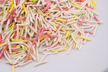 Capture the playful and colorful essence of dried bubur cha cha ingredients with this detailed close-up. 