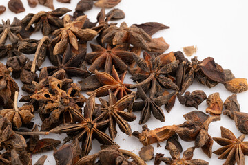 Capture the unique beauty and potent aroma of star anise with this detailed close-up. 