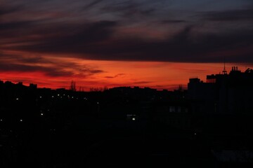 View of beautiful sky over city at sunset