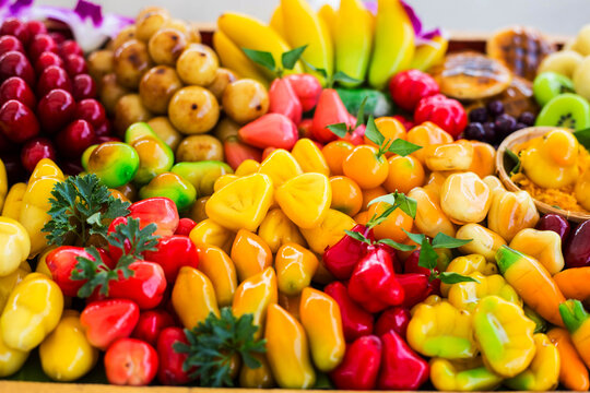 Deletable Imitation Fruits (Kanom Look Choup) .
Gelatin dipped fruit or vegetable shaped mung beans. Luk chup or look choop Marzipan in Portuguese 