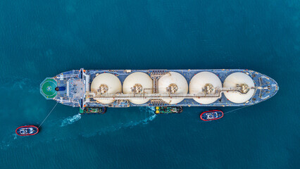 LNG (Liquified Natural Gas) tanker anchored in Gas terminal gas tanks for storage. Oil Crude Gas...