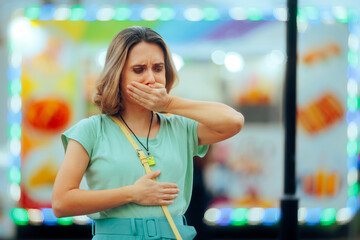 Woman Feeling Sick After Eating Street Food. Person having a bad experience after having a...