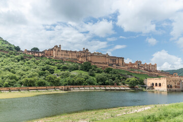 Amer Fort in Jaipur, Rajasthan, showcases stunning Rajput military hill architecture, set against a...