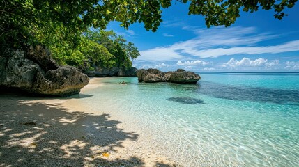 Obraz premium Secluded Bay with Crystal Clear Water and Rocky Outcrops