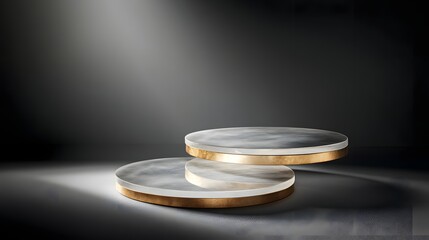 Elevated Round Marble Display Platforms with Gold Accents on Dark Backdrop