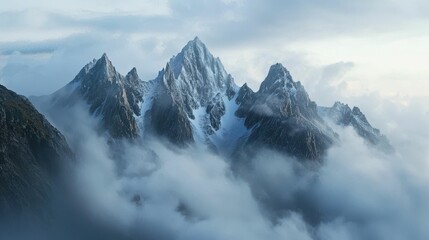 Fototapeta premium Majestic Mountain Peaks Towering Above Low Hanging Clouds