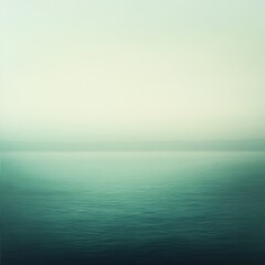 Fototapeta premium Tranquil and Serene Water Surface with Soft Tones and Misty Horizon Creating a Dreamlike and Peaceful Atmosphere for Reflection and Calmness