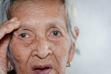 The old woman's felling lonely.(dementia and Alzheimer’s disease)	
