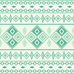 Green and soft yellow abstract geometric Native American ethnic boho seamless pattern. Navajo patterns. Tribal pattern. Folk motif. Vector texture for wallpaper, rugs, carpets, tiles, and pottery.