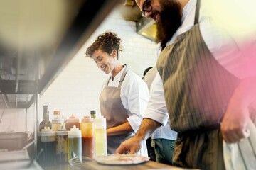 Closeup of kitchen staff prepare cooking ingredients