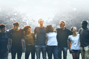 Happiness group of people huddle and smiling together