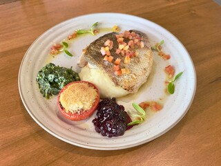 Sea bass steak. Seafood main course. 