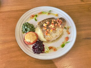 Sea bass steak. Seafood main course. 