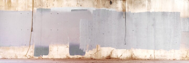 Concrete wall with gray paint patches. Rough texture, urban feel. Gray paint, concrete wall, urban setting. Industrial vibe, gray tones, concrete surface. Urban city concrete banner photo. © Rawpixel.com