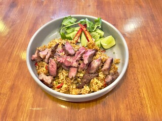 Thai spicy fried rice with beef steak 
