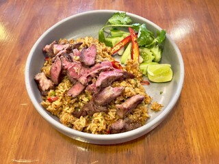 Thai spicy fried rice with beef steak 
