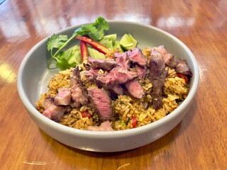 Thai spicy fried rice with beef steak 