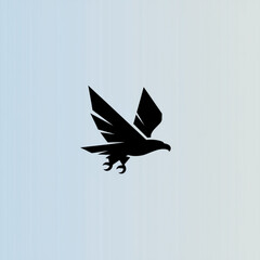 Fototapeta premium Flying hawk icon with spread wings for logo or symbol design