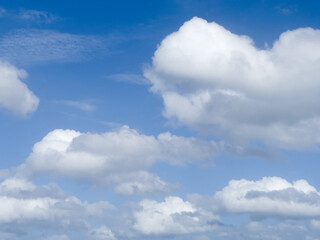 Fototapeta premium Summer blue sky with white clouds background and texture 