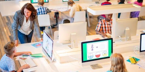 Classroom with diverse children using computers. Teacher assists students. Kids learning with technology. Bright, engaging educational environment. Teacher teaching young students.