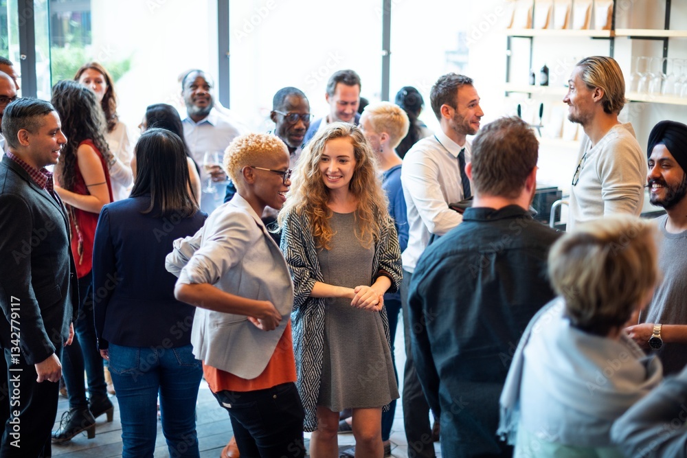Aufkleber diverse group socializing at a casual event. men and women of various ethnicities engaged in convers
