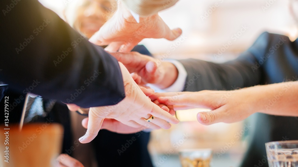 Aufkleber Diverse group of hands joining in teamwork. Hands of different ethnicities in a circle. Teamwork and collaboration symbolized by hands together. Business corporate group teamwork concept.