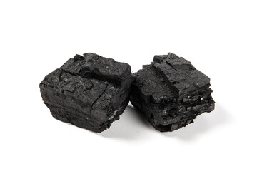 Obraz premium Natural wood charcoal isolated on white background.