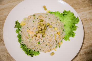 Chinese Food Special Yangchow Fried Rice barbecue pork, shrimp or prawn, onions and peas are added to fried rice cooked with egg