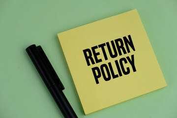 text RETURN POLICY on the yellow stick note 