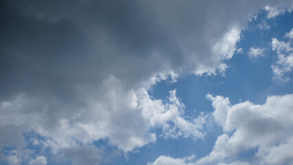 Background pattern and texture of black and white clouds in the blue sky. Copy space for text. For graphic design, 3D rendering and banner background