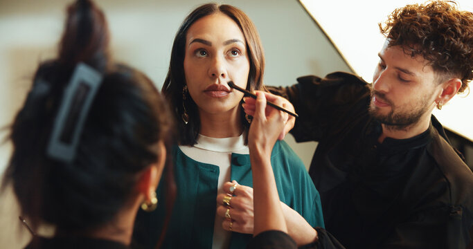 Photography, backstage and woman with styling team in studio for production, preparation or photoshoot. Creative, media and female model with makeup artist and hairdresser for magazine editorial. - Powered by Adobe