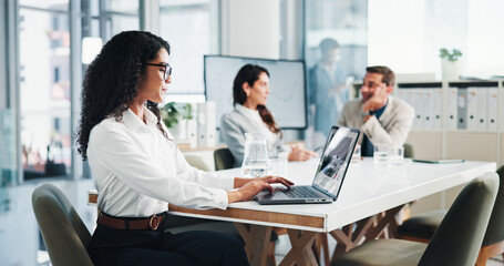 Meeting, businesswoman and typing with laptop in office, about us and research for stock market. Boardroom, female person and trader with tech for financial performance, risk management and corporate